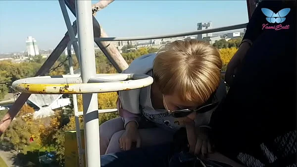 Public blowjob on the ferris wheel from shameless whore